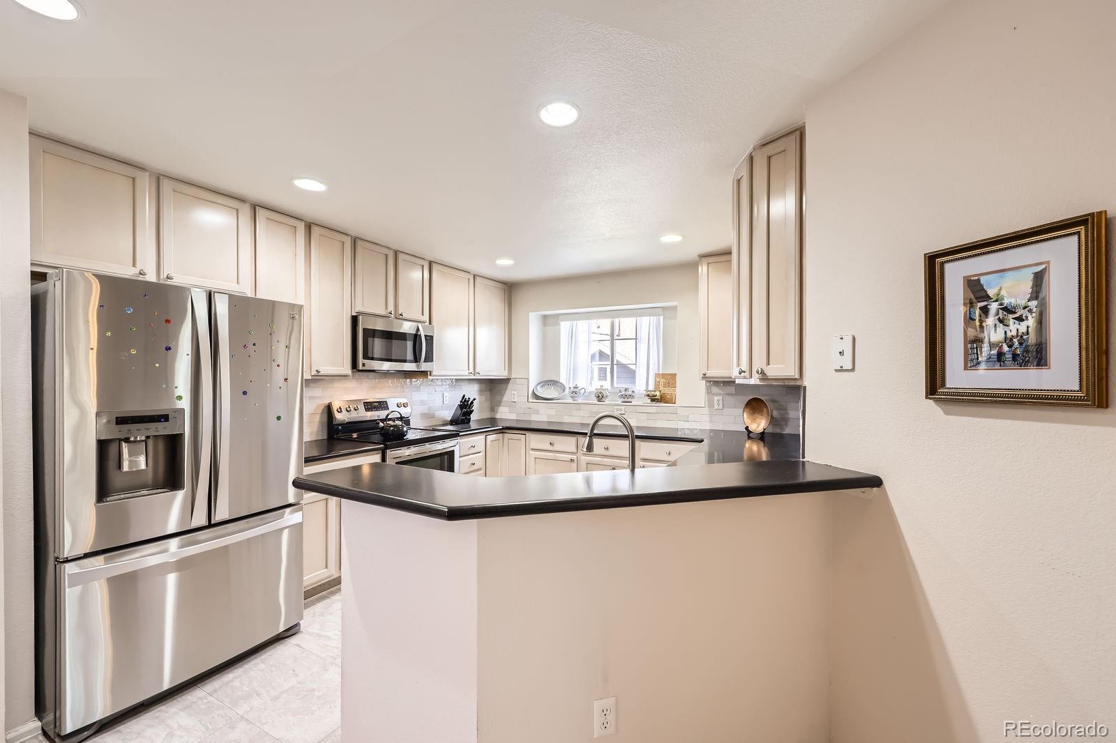 7774 S Biloxi Way, aurora  House Search MLS Picture