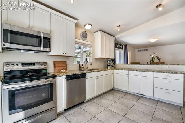 MLS Image for 6020  Castlewood  ,Colorado Springs, Colorado