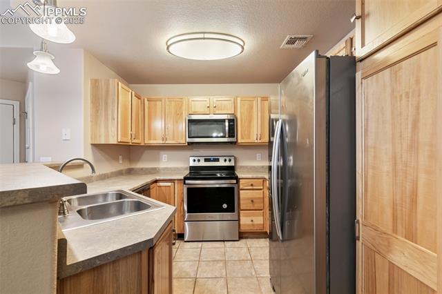 MLS Image for 555  Cougar Bluff  107 ,Colorado Springs, Colorado