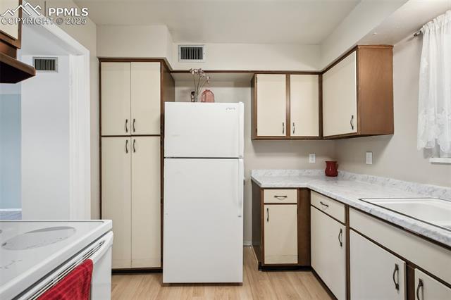 MLS Image for 2902  Airport  207 ,Colorado Springs, Colorado