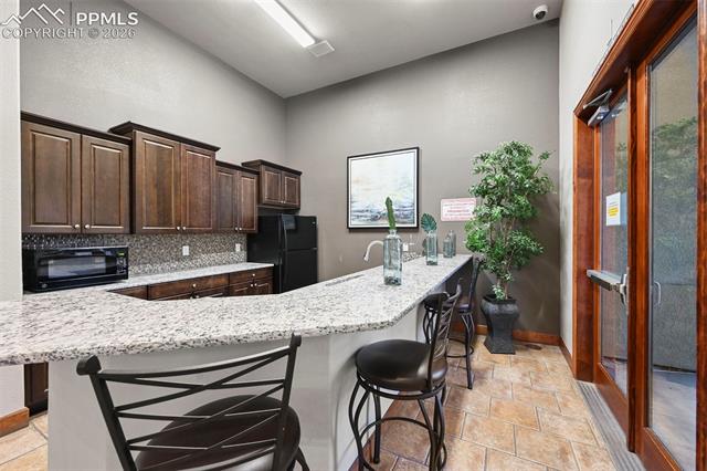 MLS Image for 7045  Ash Creek  202 ,Colorado Springs, Colorado