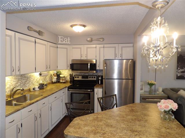 MLS Image for 411  Lakewood  A306 ,Colorado Springs, Colorado