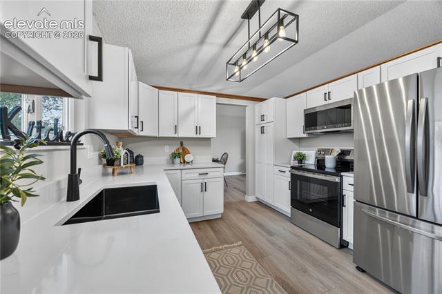MLS Image for 7410  Woody Creek  ,Colorado Springs, Colorado