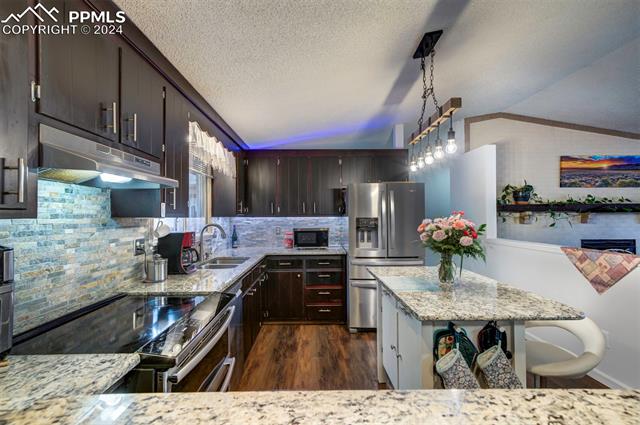 MLS Image for 1210 W Woodmen  ,Colorado Springs, Colorado