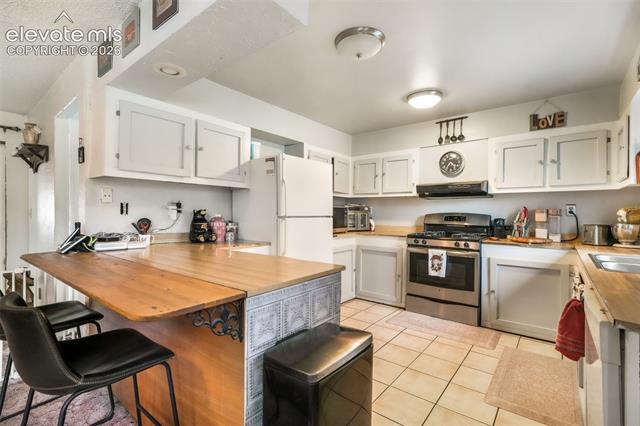 MLS Image for 127  3rd  ,Monument, Colorado