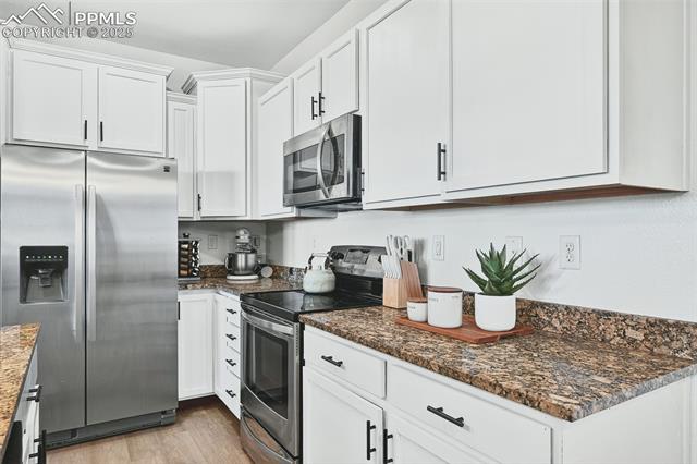 MLS Image for 4895  Wells Branch  102 ,Colorado Springs, Colorado