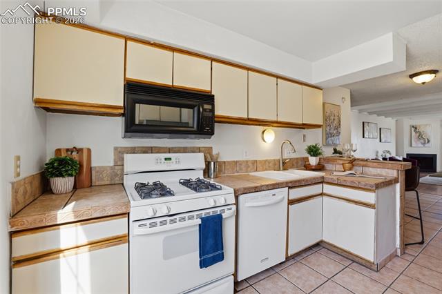 MLS Image for 3440  Parkmoor Village  P ,Colorado Springs, Colorado