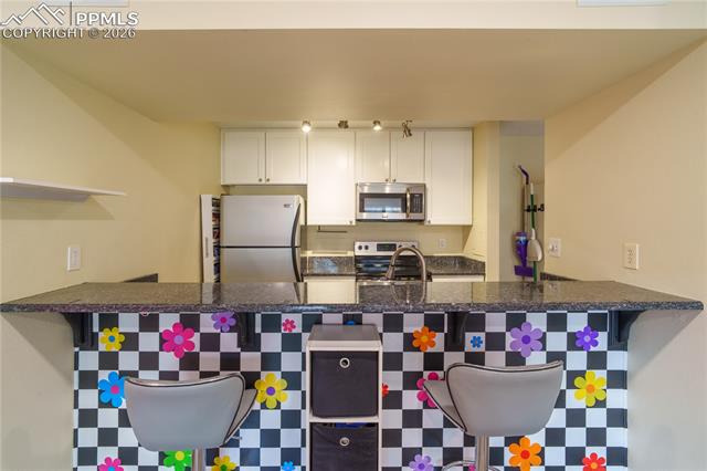 MLS Image for 935  Saturn  215 ,Colorado Springs, Colorado
