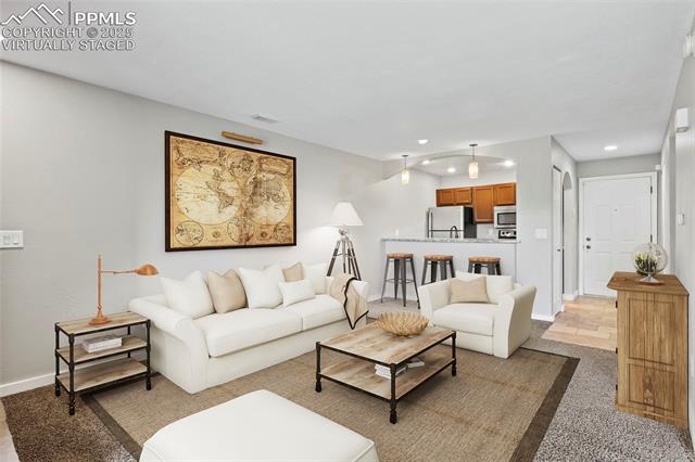MLS Image for 128 W Rockrimmon  105 ,Colorado Springs, Colorado