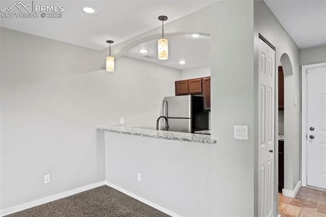 MLS Image for 128 W Rockrimmon  105 ,Colorado Springs, Colorado