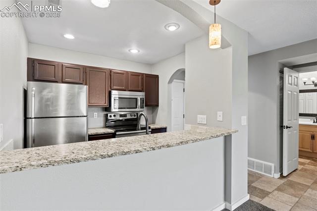 MLS Image for 128 W Rockrimmon  105 ,Colorado Springs, Colorado