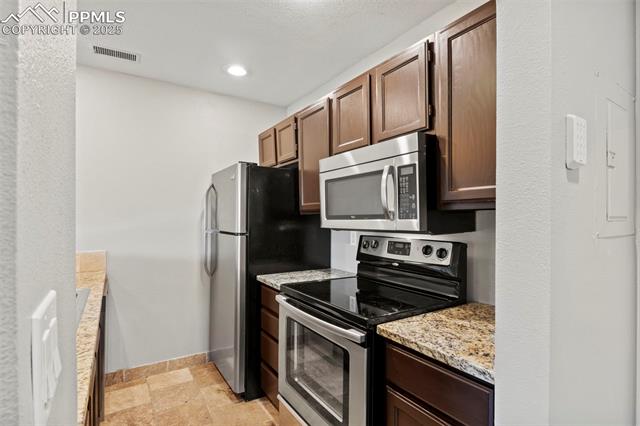 MLS Image for 128 W Rockrimmon  105 ,Colorado Springs, Colorado