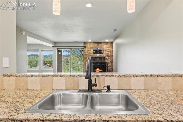 MLS Image for 128 W Rockrimmon  105 ,Colorado Springs, Colorado