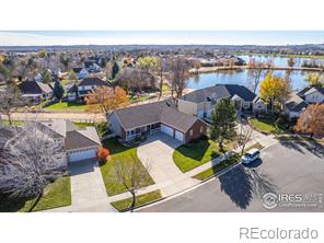 401  Poudre Bay , windsor MLS: 456789978876 Beds: 5 Baths: 4 Price: $688,000