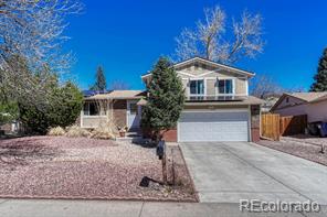 15005 E Oregon Drive, aurora MLS: 5169136 Beds: 4 Baths: 3 Price: $525,000