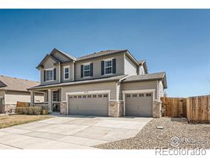 10130  Mobile Street, commerce city MLS: 123456789985984 Beds: 4 Baths: 3 Price: $615,000