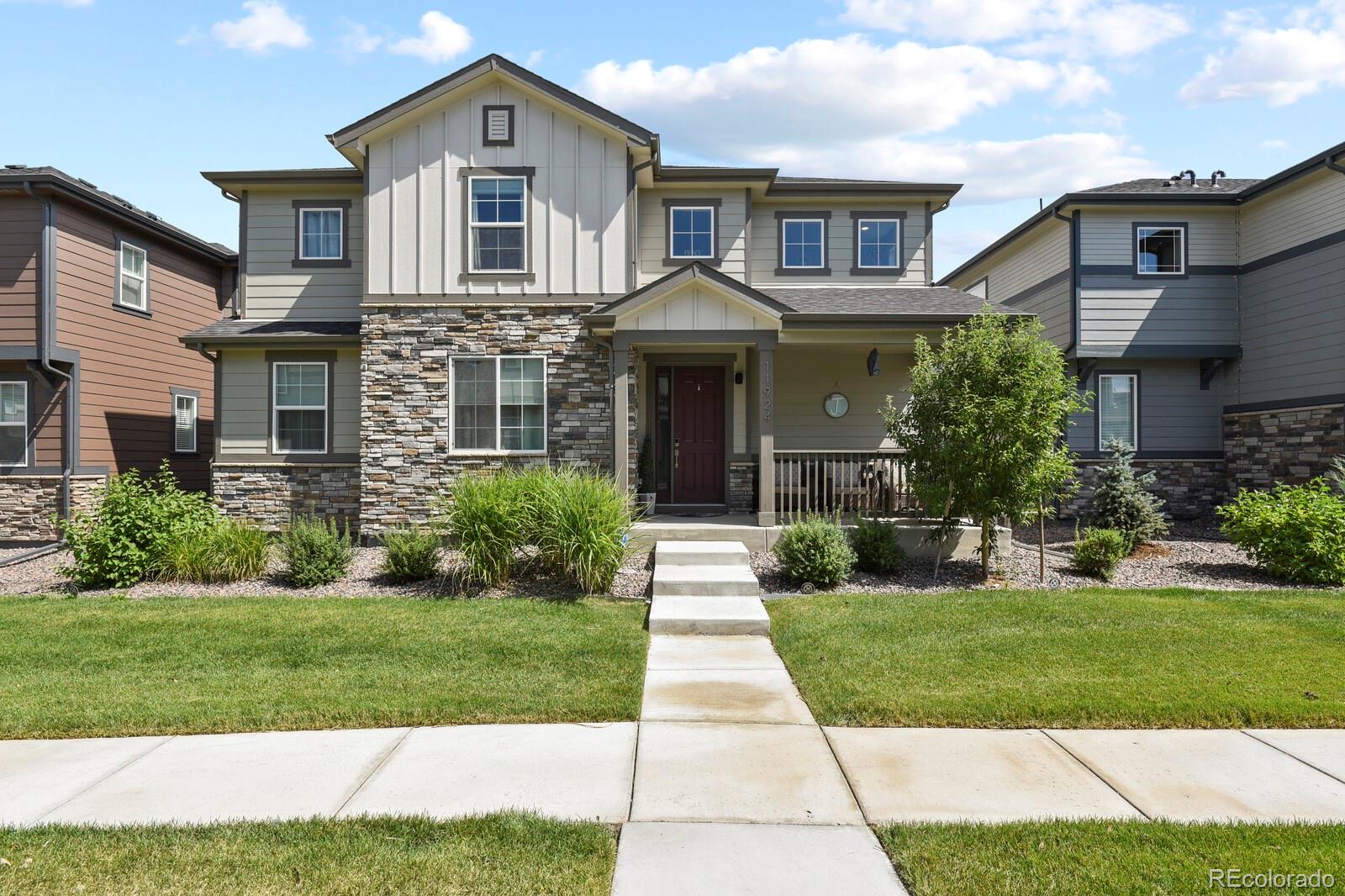 11924  Norfolk Court, commerce city MLS: 7768235 Beds: 4 Baths: 3 Price: $495,000