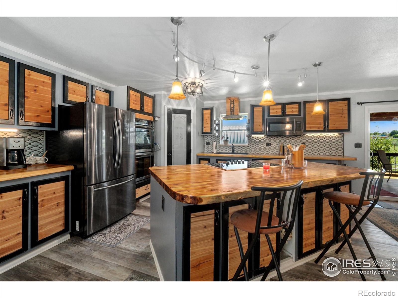 7784  Harold Street, fort lupton MLS: 456789992624 Beds: 4 Baths: 3 Price: $620,000