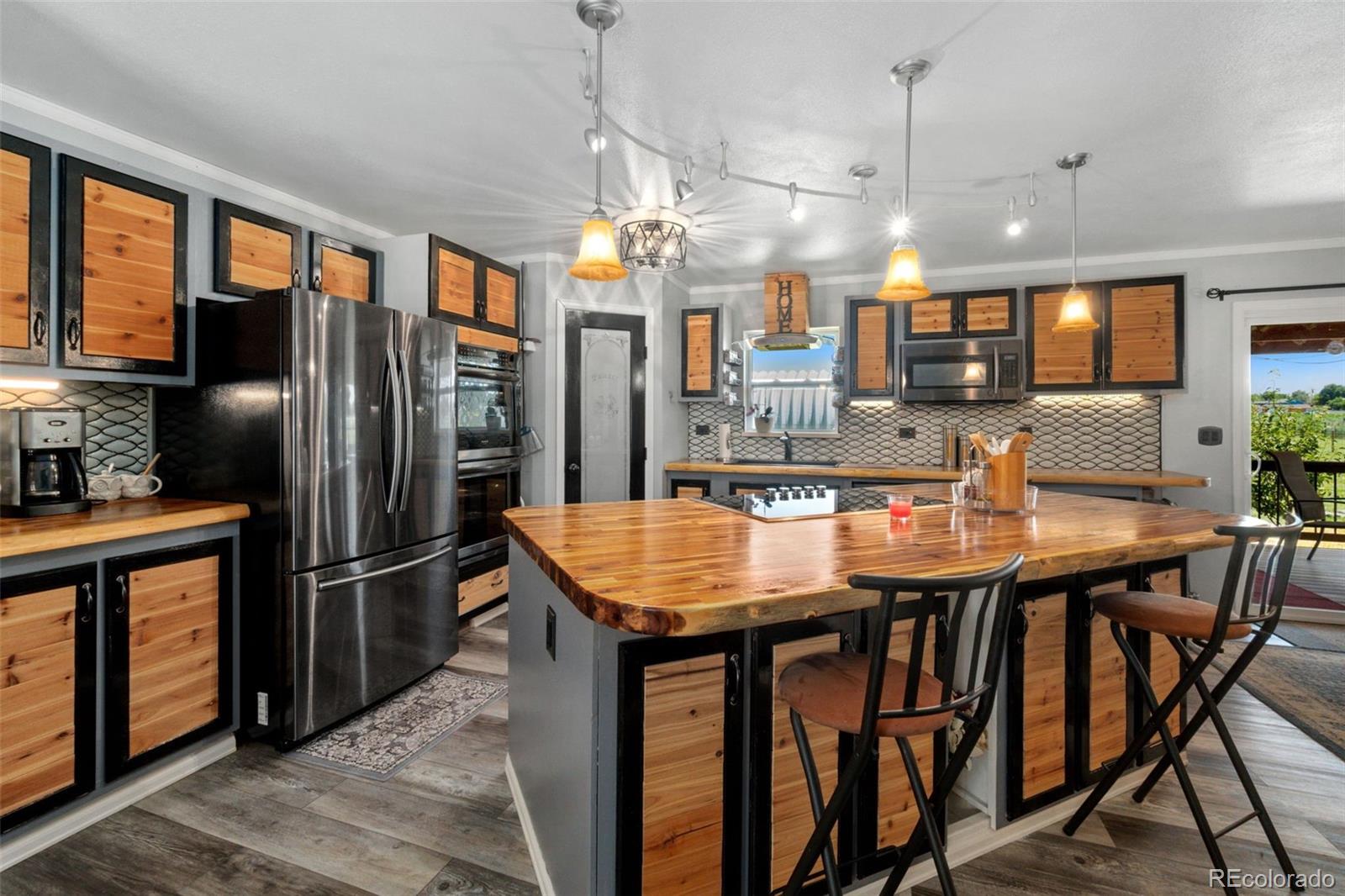 7784  Harold Street, fort lupton MLS: 7249255 Beds: 4 Baths: 3 Price: $620,000