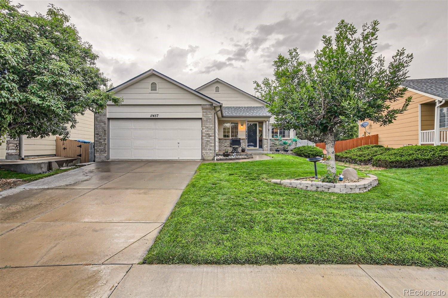 11457 E 116th Drive, commerce city MLS: 8334555 Beds: 4 Baths: 3 Price: $529,900