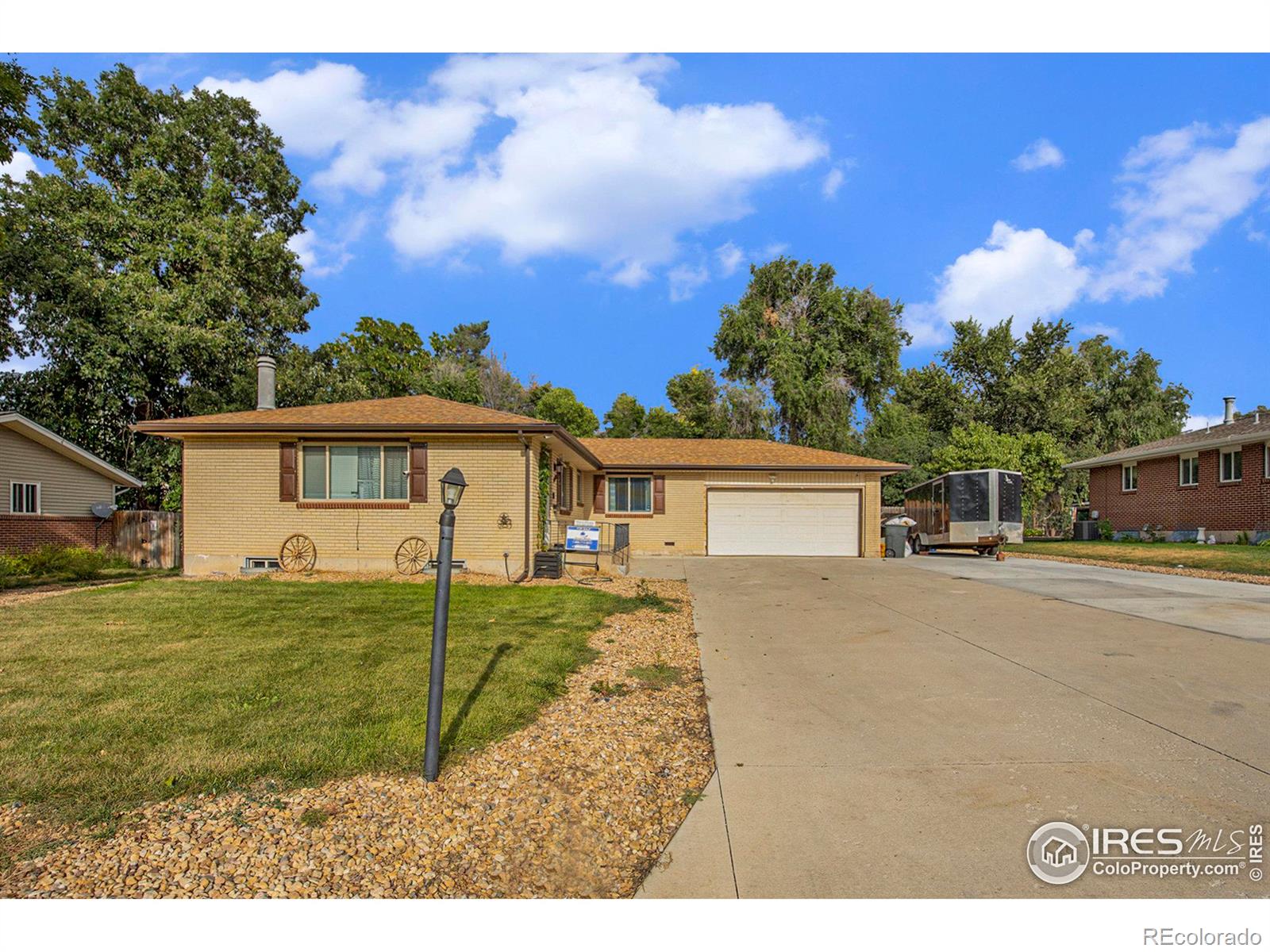 1948  23rd Ave Ct, greeley MLS: 123456789997205 Beds: 4 Baths: 3 Price: $410,000