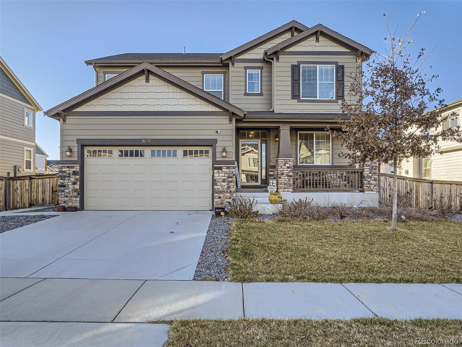 11679  Ouray Street, commerce city MLS: 5826148 Beds: 3 Baths: 3 Price: $620,000