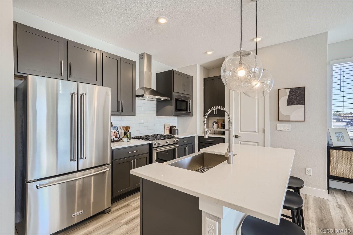 322  Geneva Street , Aurora  MLS: 7026826 Beds: 3 Baths: 3 Price: $545,990