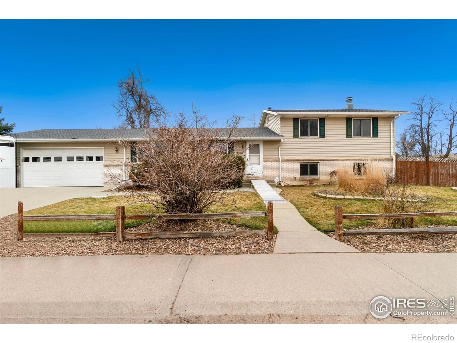 1112  Village Drive, fort lupton MLS: 4567891005044 Beds: 4 Baths: 2 Price: $400,000