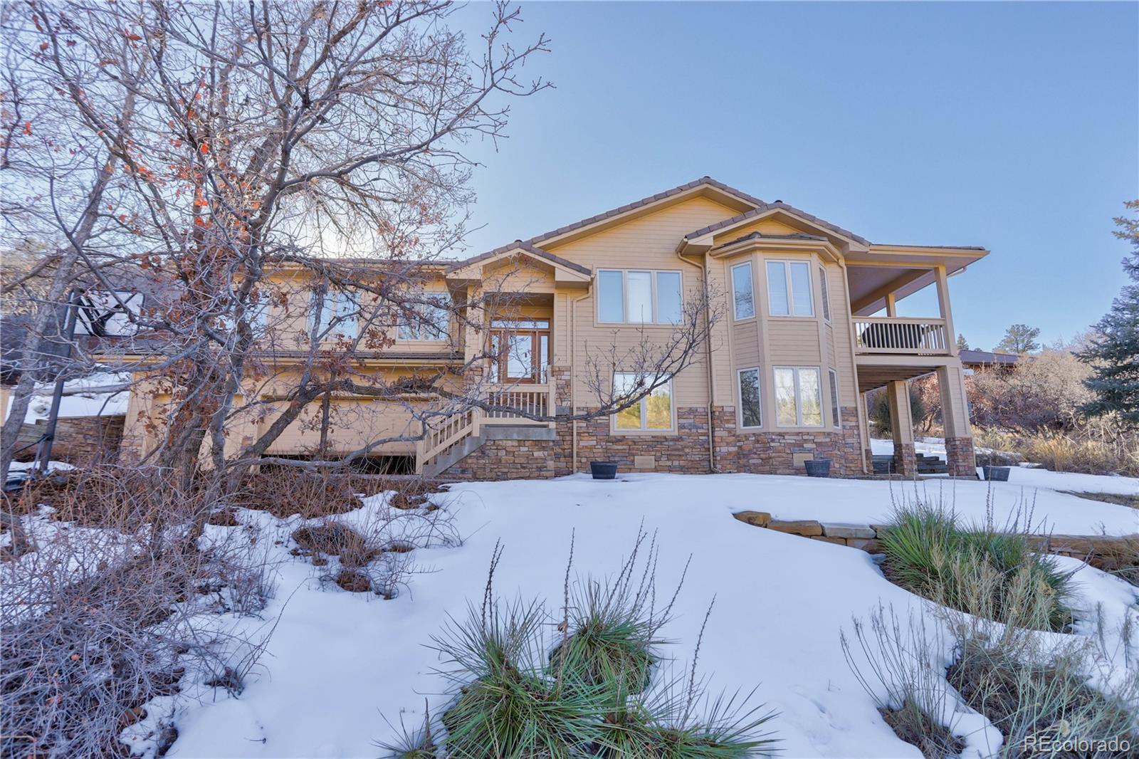 6583  Big Horn Trail, littleton MLS: 7528760 Beds: 4 Baths: 3 Price: $915,000