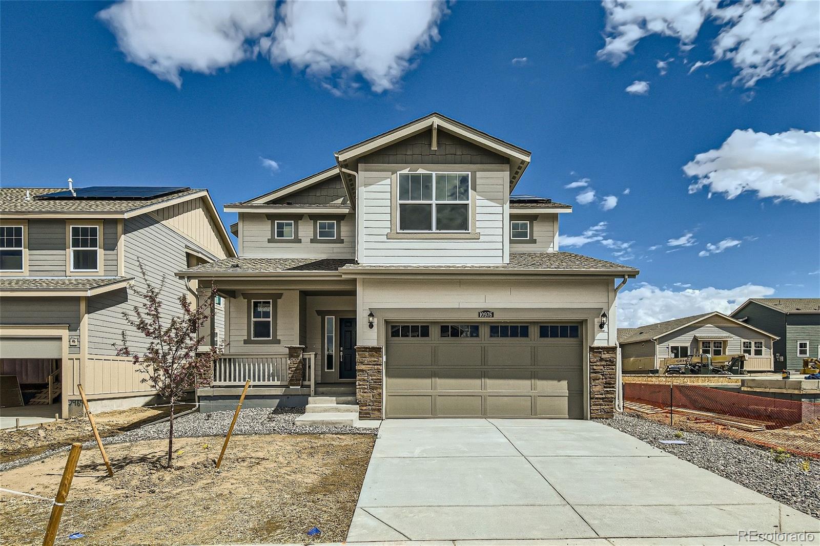 10976  Nucla Court, commerce city MLS: 8023346 Beds: 4 Baths: 3 Price: $564,900