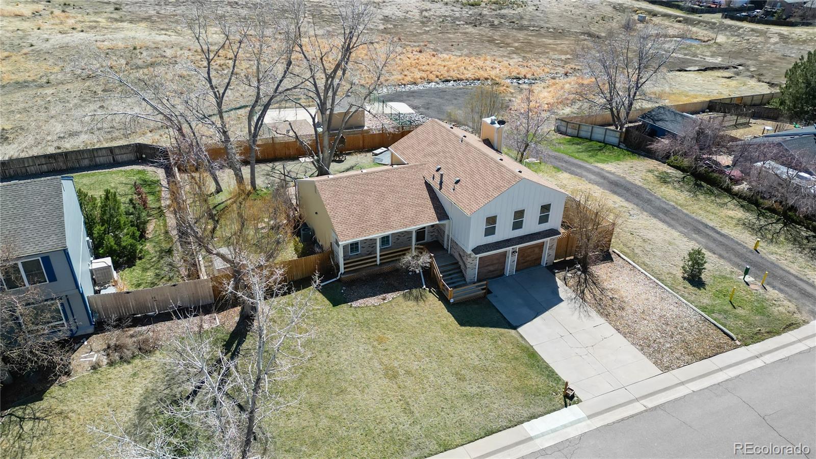 6704 E Rustic Drive, parker MLS: 5101454 Beds: 4 Baths: 3 Price: $625,000