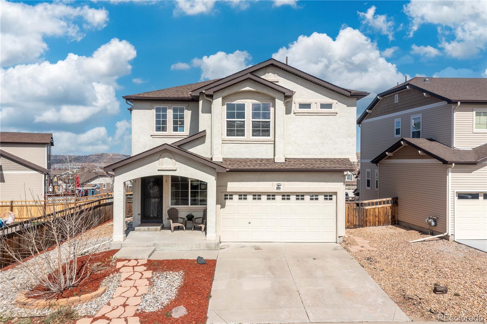 2026  Coach House Loop, castle rock MLS: 7138143 Beds: 4 Baths: 3 Price: $615,000