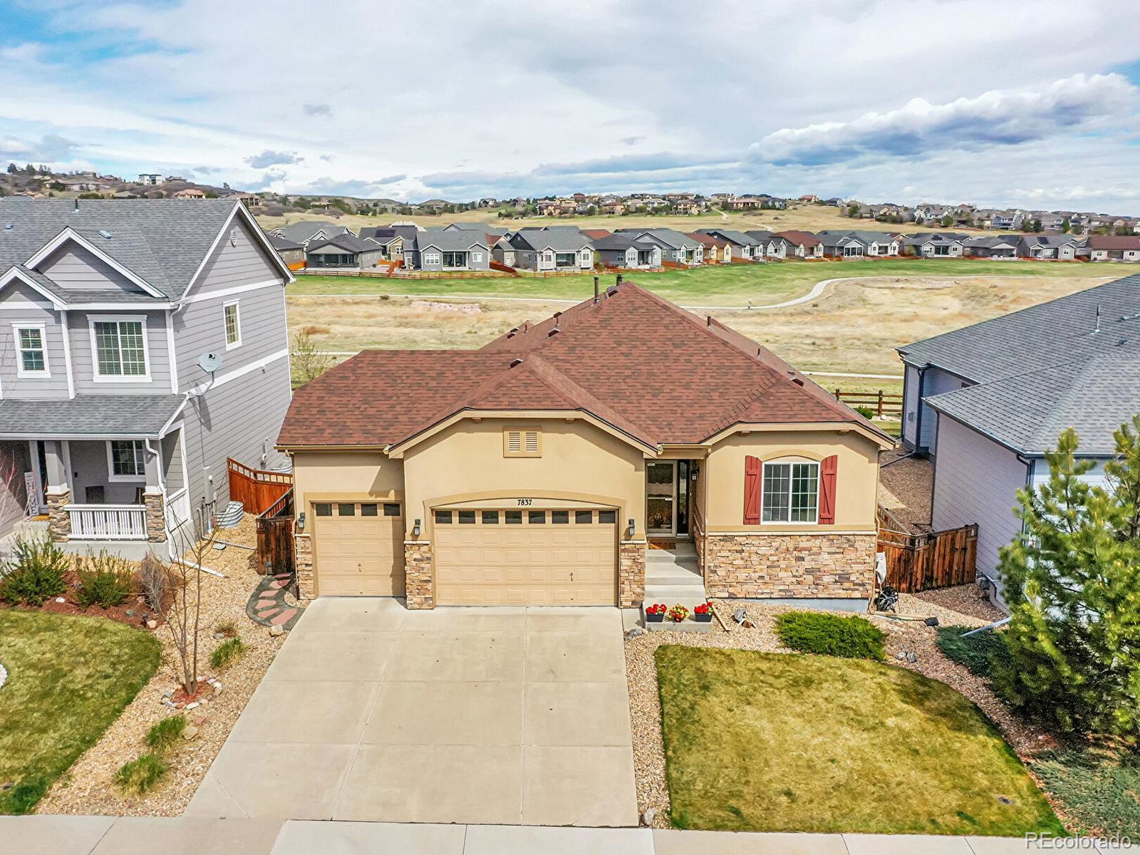 7837  Grady Circle, castle rock MLS: 2377200 Beds: 5 Baths: 3 Price: $699,000