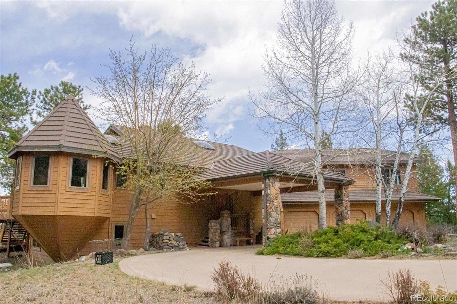 903  Wagon Trail Road, evergreen MLS: 8730622 Beds: 4 Baths: 4 Price: $1,399,000