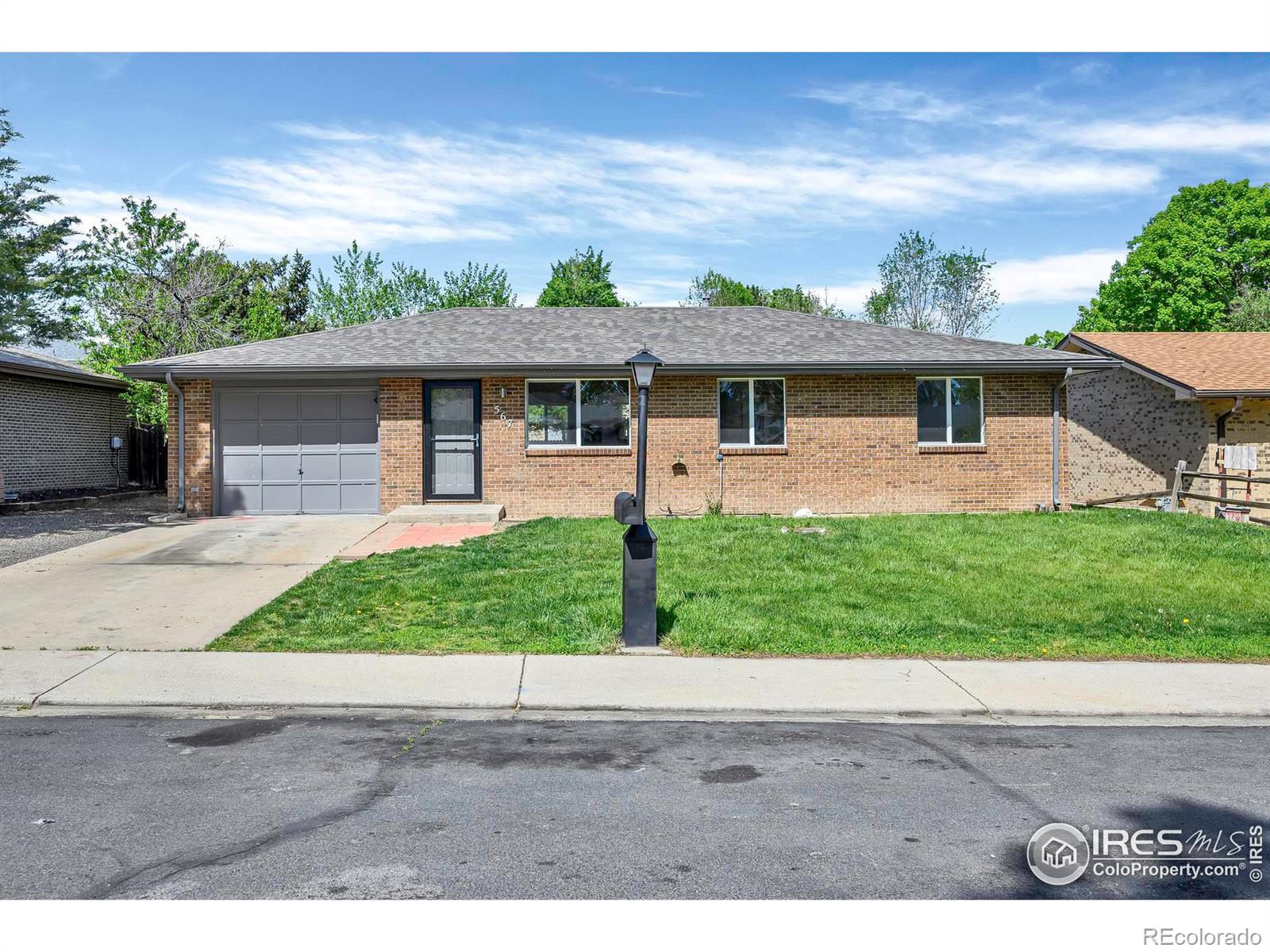 567  Mount Evans Street, longmont MLS: 4567891009486 Beds: 3 Baths: 2 Price: $479,000