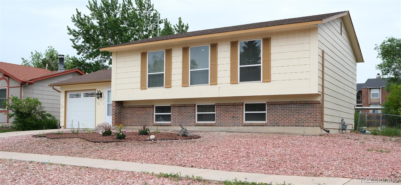 Erindale Colorado Springs Home | MLS #: 48642066545  Ashcroft Drive, Colorado Springs Beds: 4 Baths: 2 Price: $409,900