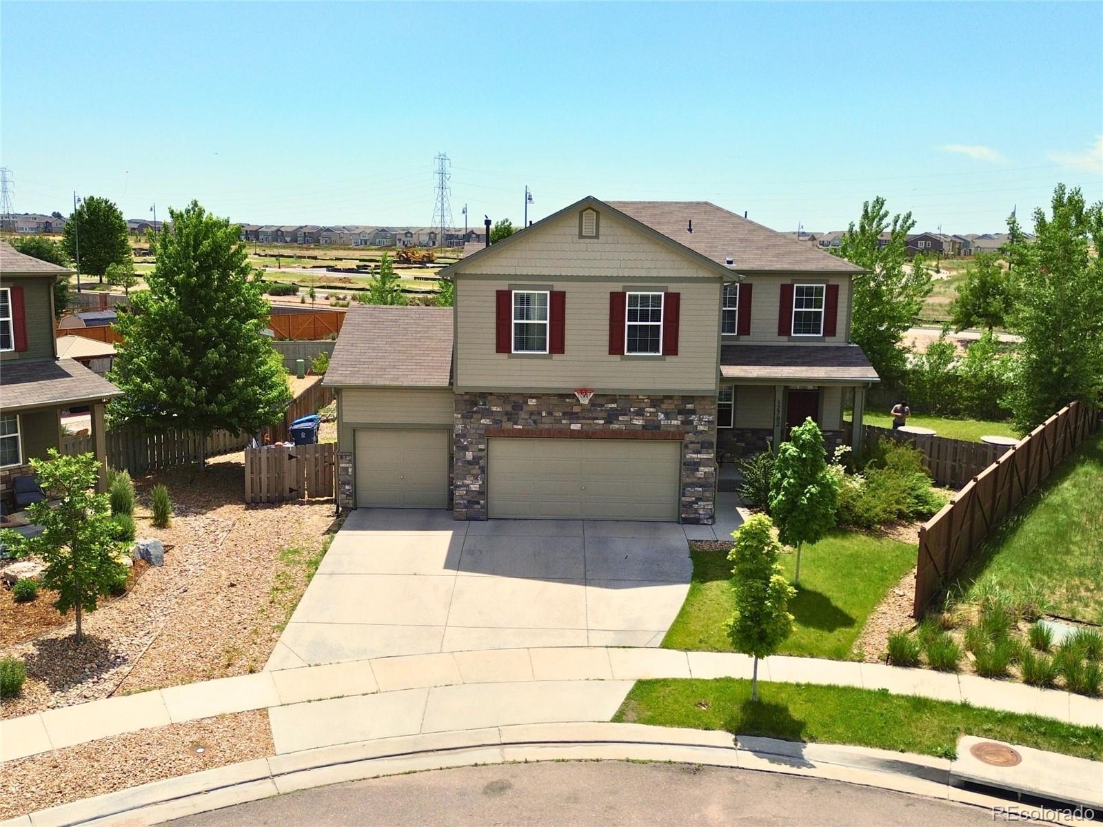 12782 E 104TH Drive, commerce city MLS: 9427580 Beds: 4 Baths: 4 Price: $549,900