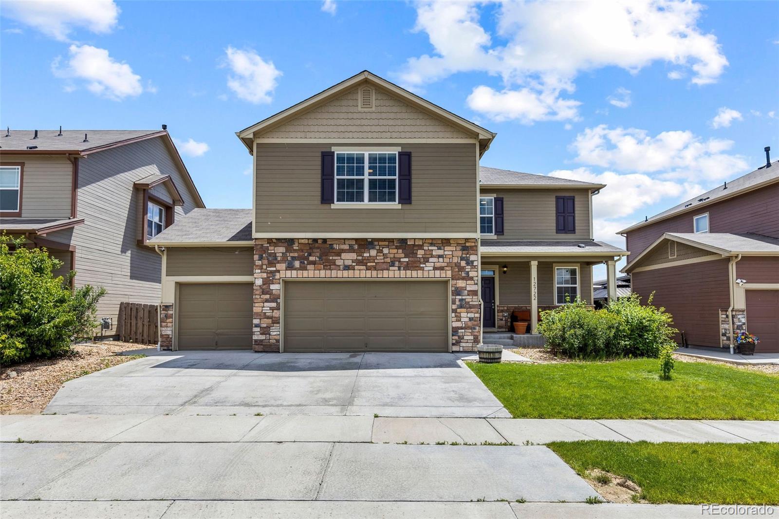 12722 E 104th Drive, commerce city MLS: 9511528 Beds: 5 Baths: 4 Price: $565,000