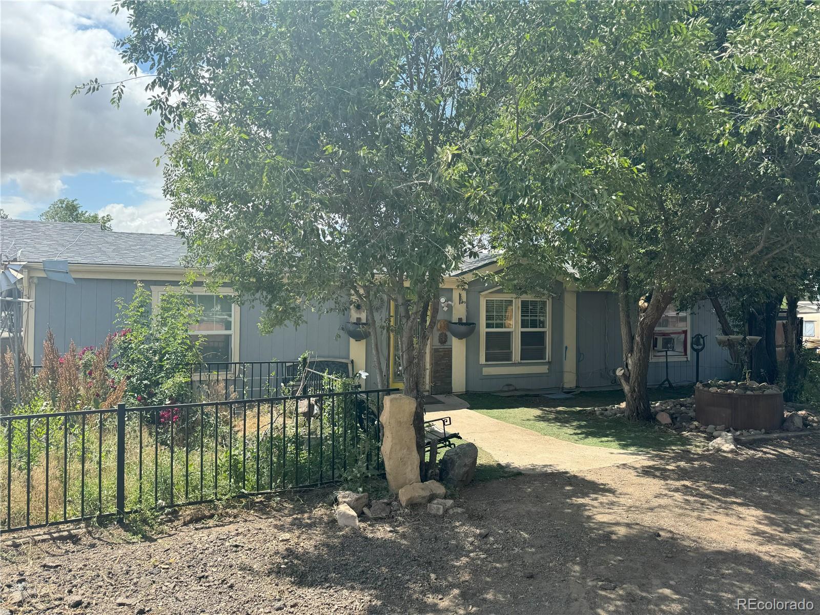 7435  Harold Street, fort lupton MLS: 8762650 Beds: 4 Baths: 2 Price: $400,000