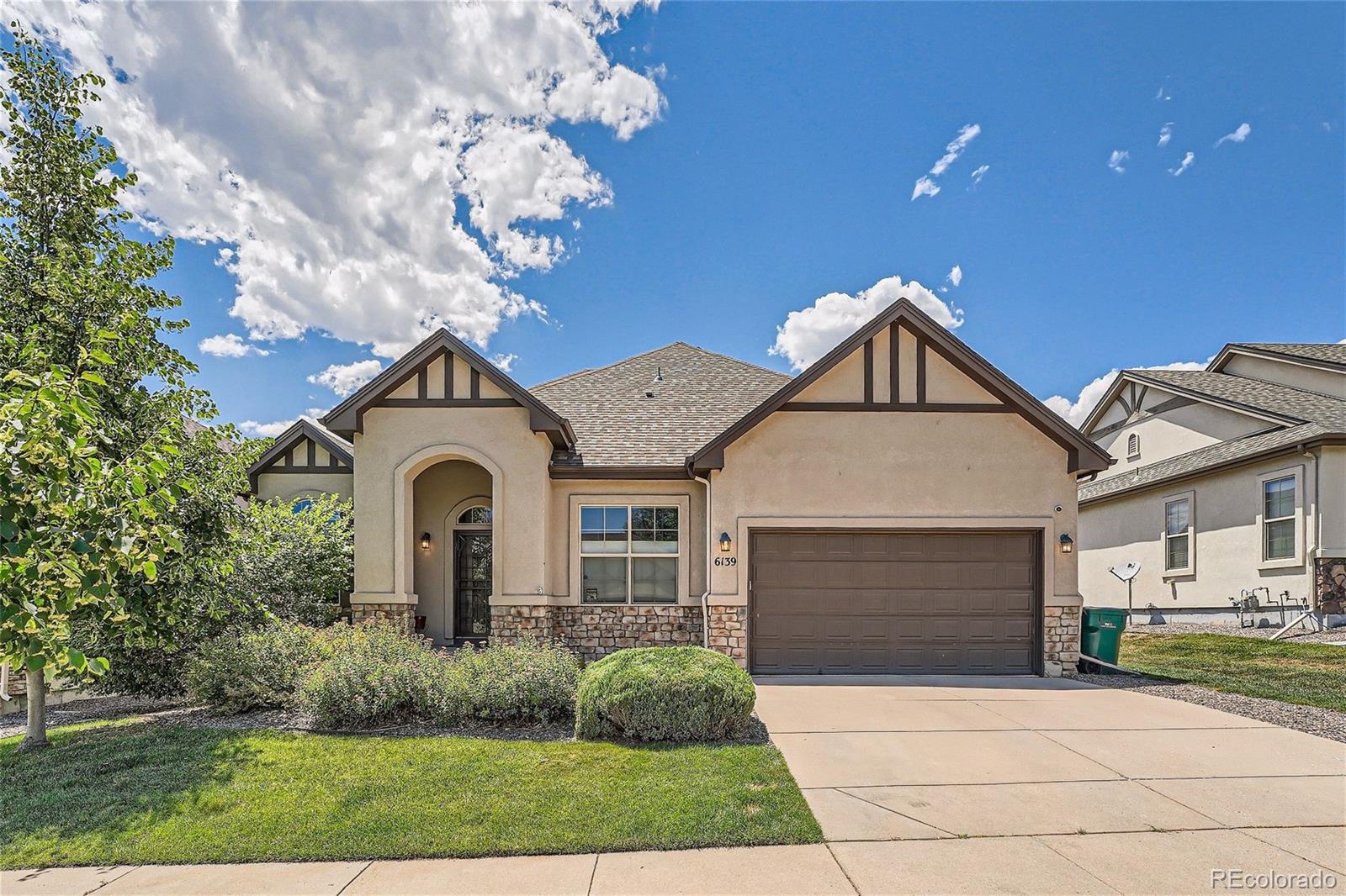 6139  Reed Way, arvada MLS: 9969321 Beds: 4 Baths: 3 Price: $769,900