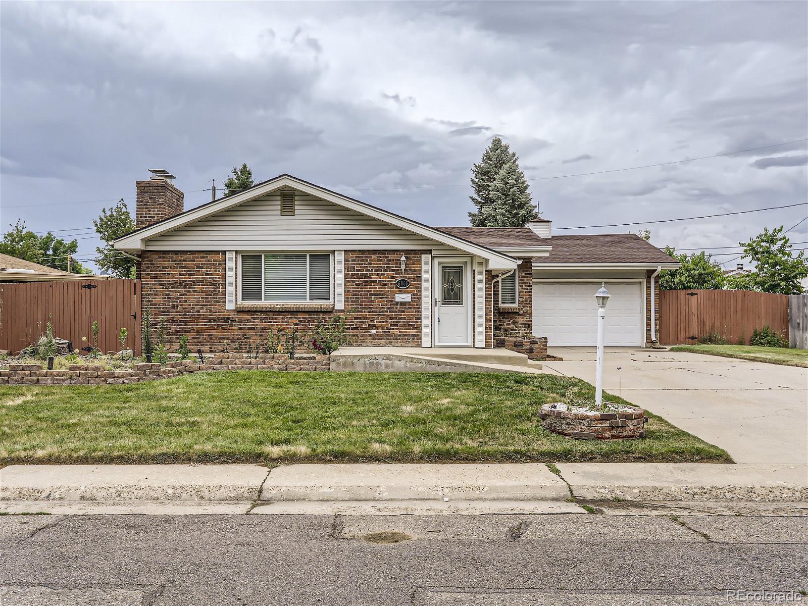 6006  Moore Street, arvada MLS: 7859310 Beds: 4 Baths: 3 Price: $540,000