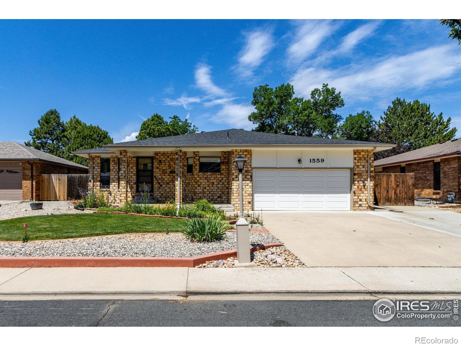 1559  Juniper Street, longmont MLS: 4567891012794 Beds: 4 Baths: 3 Price: $590,000