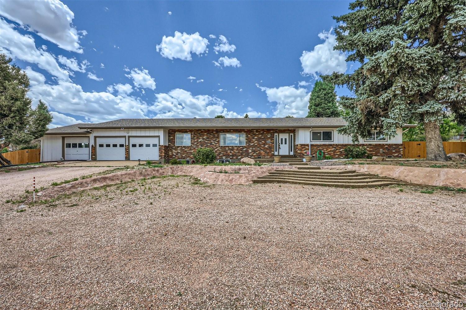 Rustic Hills Colorado Springs Home | MLS #: 80297202304  Lazy R Lane, Colorado Springs Beds: 4 Baths: 3 Price: $669,000