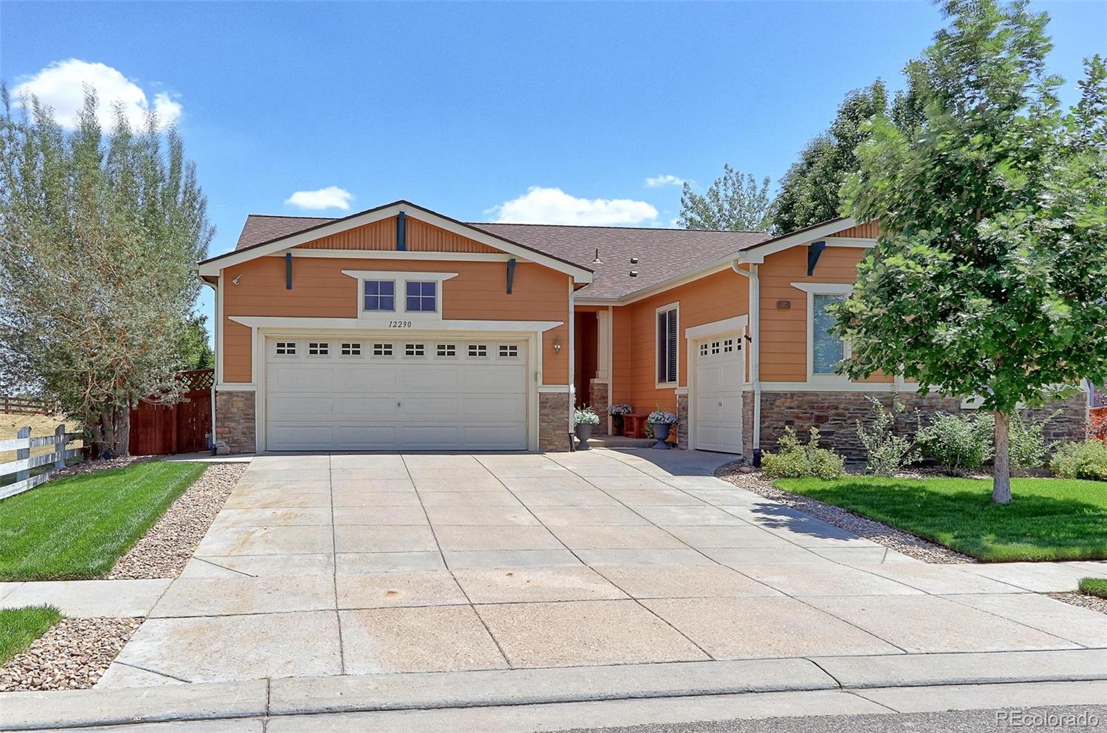 12290  Village Circle, commerce city MLS: 2852932 Beds: 4 Baths: 4 Price: $725,000