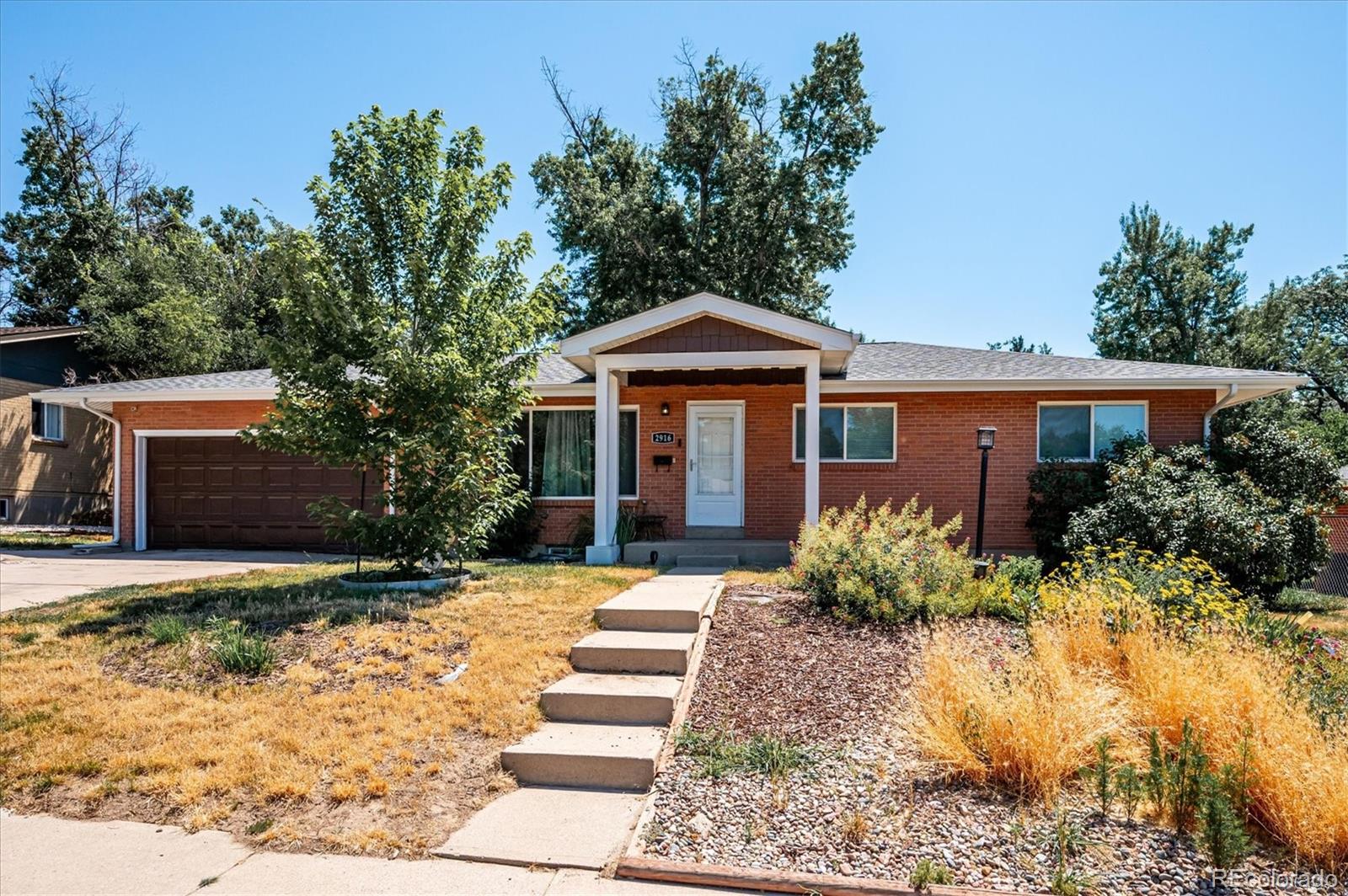 2916 S Sheridan Boulevard, denver MLS: 5741578 Beds: 3 Baths: 3 Price: $524,900