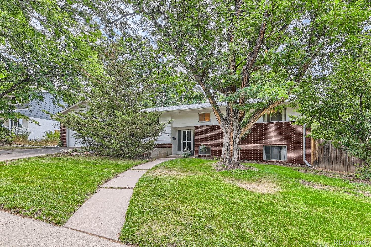 2772 S Knoxville Way, denver MLS: 9529722 Beds: 4 Baths: 3 Price: $595,000