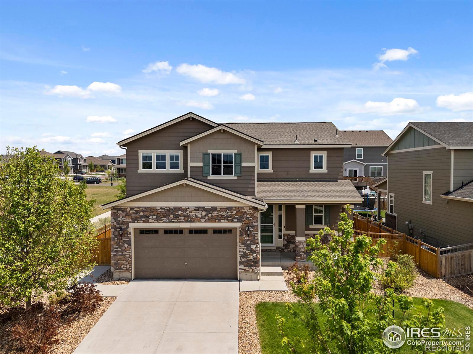 6074 N Genoa Way, aurora MLS: 4567891014601 Beds: 4 Baths: 4 Price: $600,000