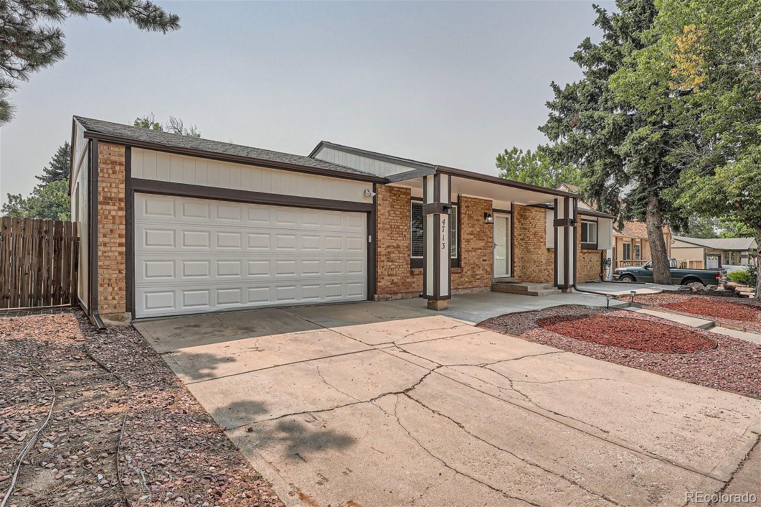 4713 S Lewiston Way, aurora MLS: 6734070 Beds: 5 Baths: 3 Price: $510,000