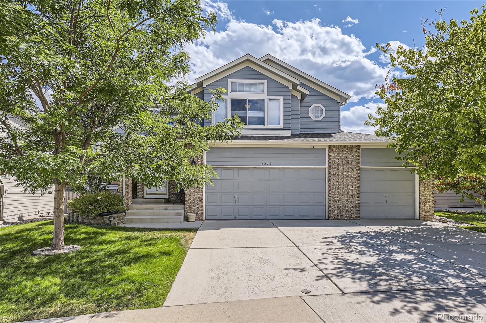 6573 S Xenophon Street, littleton MLS: 5616748 Beds: 5 Baths: 3 Price: $775,000