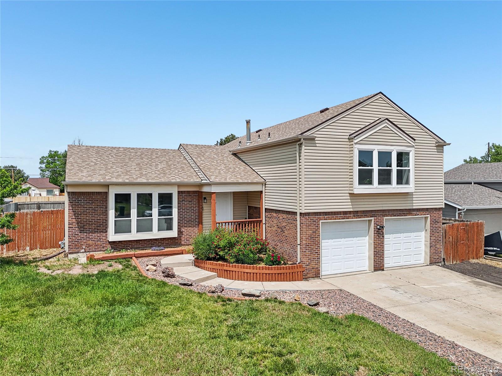 Mills Aurora Home | MLS #: 66235881973  Bahama Street, Aurora Beds: 4 Baths: 3 Price: $500,000